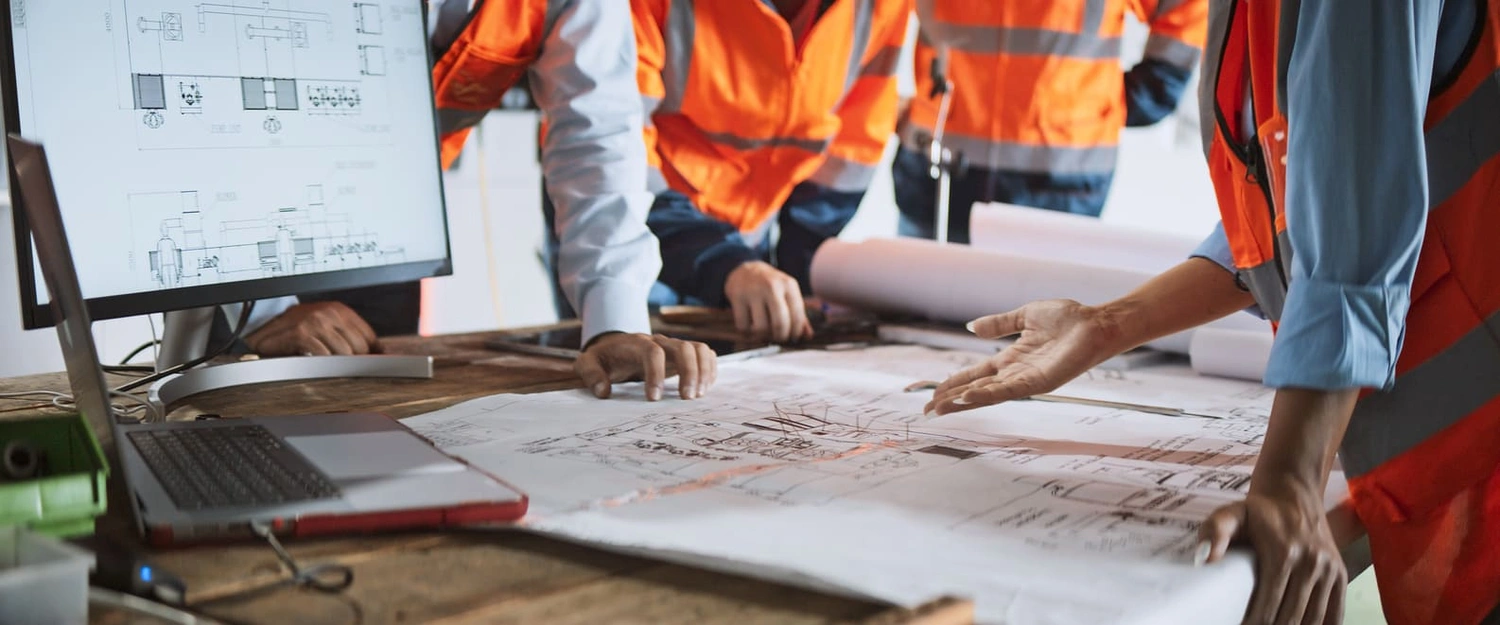 Team meeting to reduce printing costs in construction and eliminate costly rework