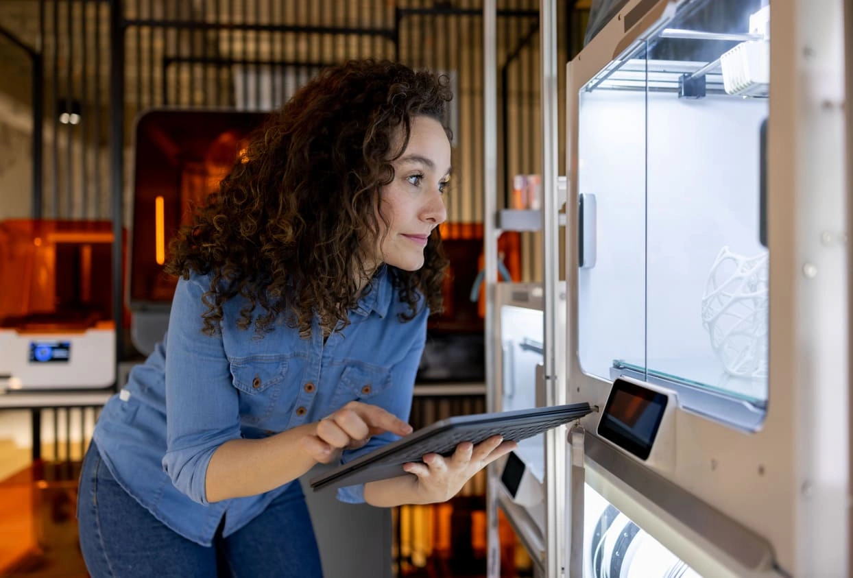 Product designer using CAD printers and 3D printing to develop prototypes