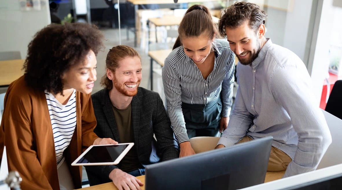 Coworkers deciding which A2 plotter printer model fits their needs