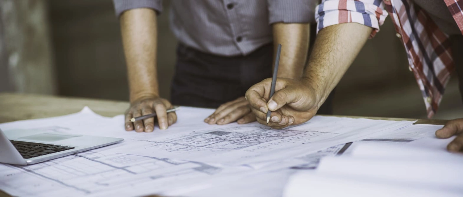 Architects revising details on draft prints