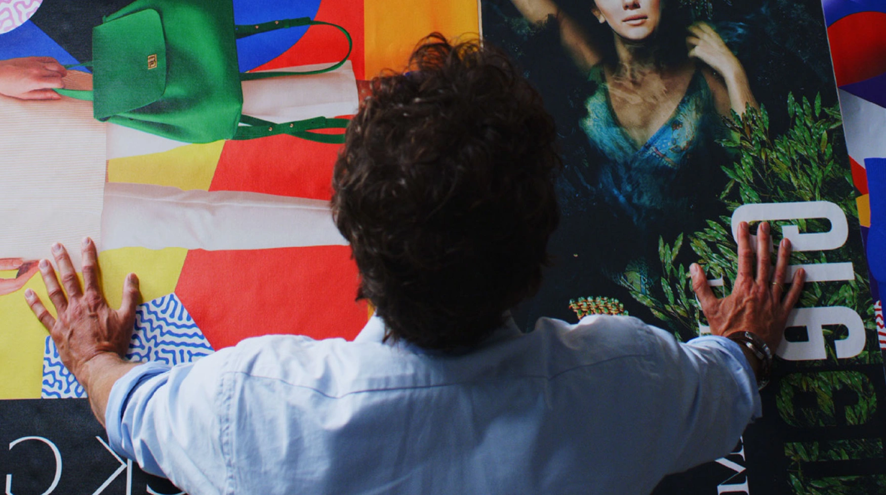 Commercial Printing Trends | Birdseye View of Man Looking at Prints | HP Virtual Booth