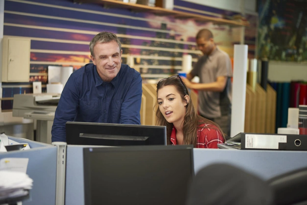 Large format art printing shop finalizing an order