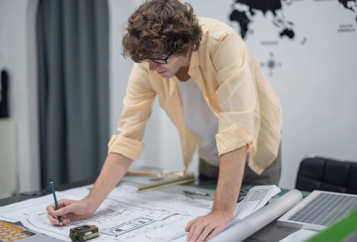 Architect printing detailed designs with the best large format printer for small business for easy in-office markup Architect printing detailed designs with the best large format printer for small business for easy in-office markup