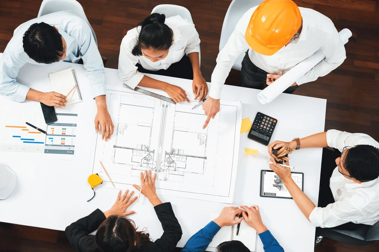 Team using printouts and a plotter printer as their main collaborative AEC tools Team using printouts and a plotter printer as their main collaborative AEC tools