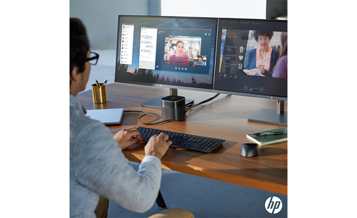 Employee on a video call with his team discussing CAD software