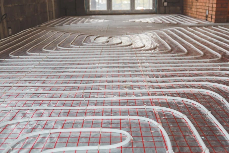 In-progress construction of a radiant heating floor system