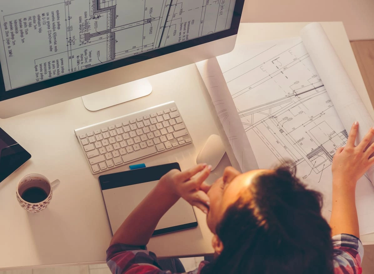 Architect revising technical printing settings to print CAD drawing documents