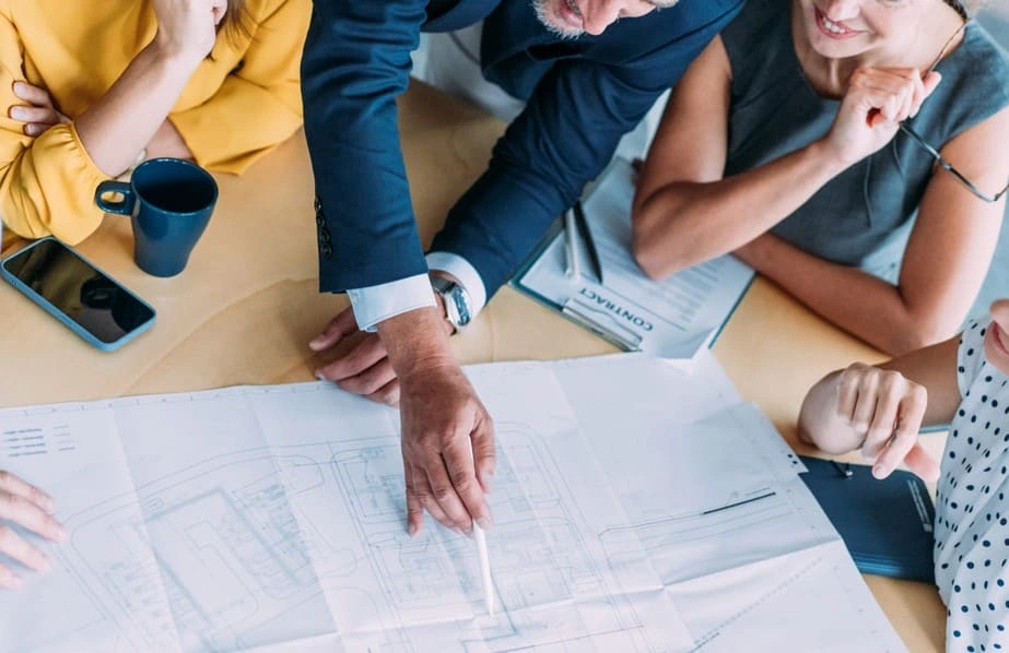 Coworkers seeing higher-quality prints after investing in plotter upgrade options Coworkers seeing higher-quality prints after investing in plotter upgrade options