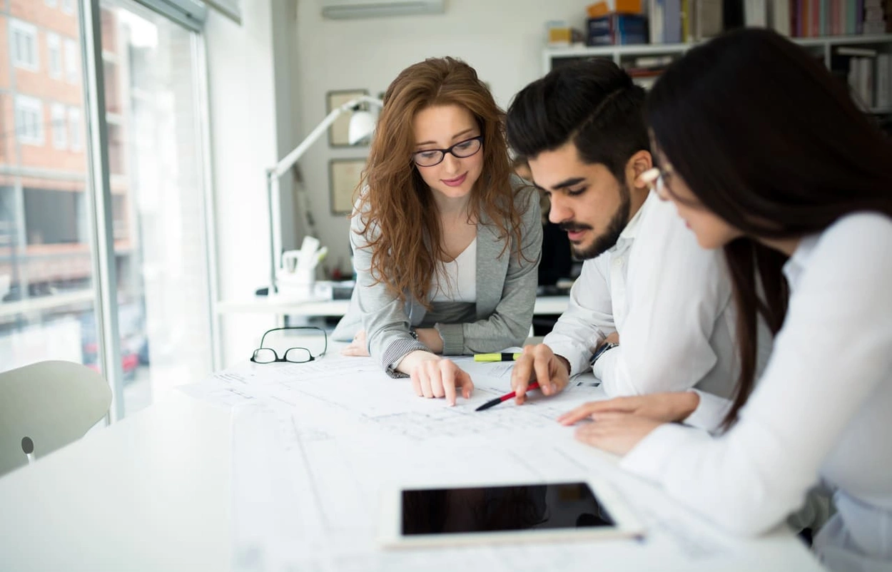Team looking at different plotter printers within their budget Team looking at different plotter printers within their budget
