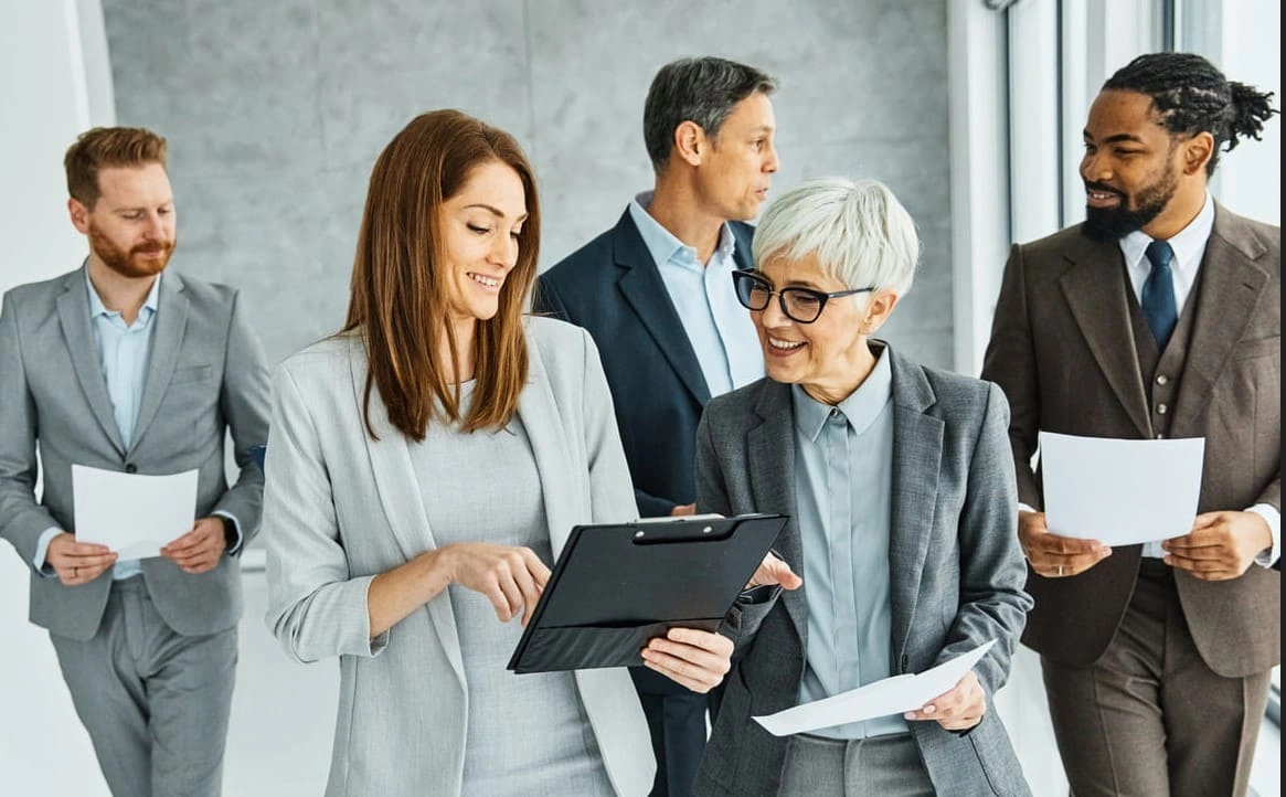 AEC team discussing large format printer maintenance processes