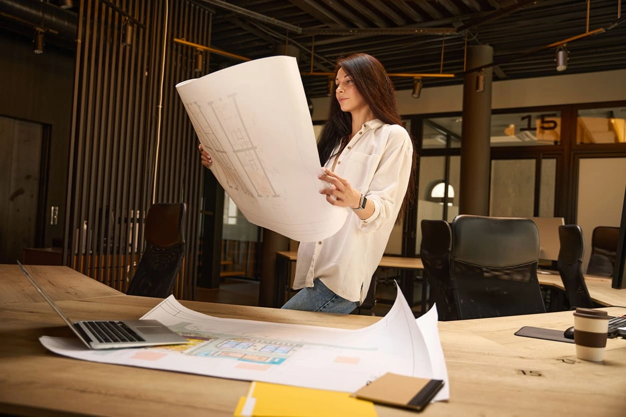 AEC professional examining results after implementing wide format printing tips AEC professional examining results after implementing wide format printing tips