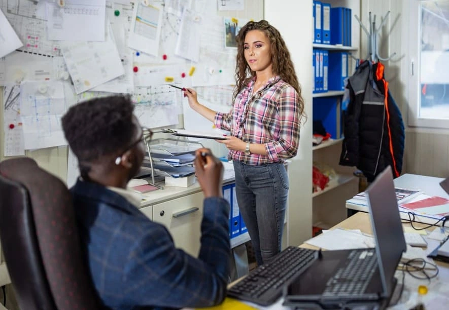 Team discussing the application of GIS data in urban planning projects